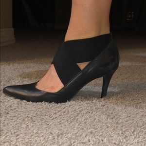 Black leather 3-1/4 inch heels.  Worn a few times